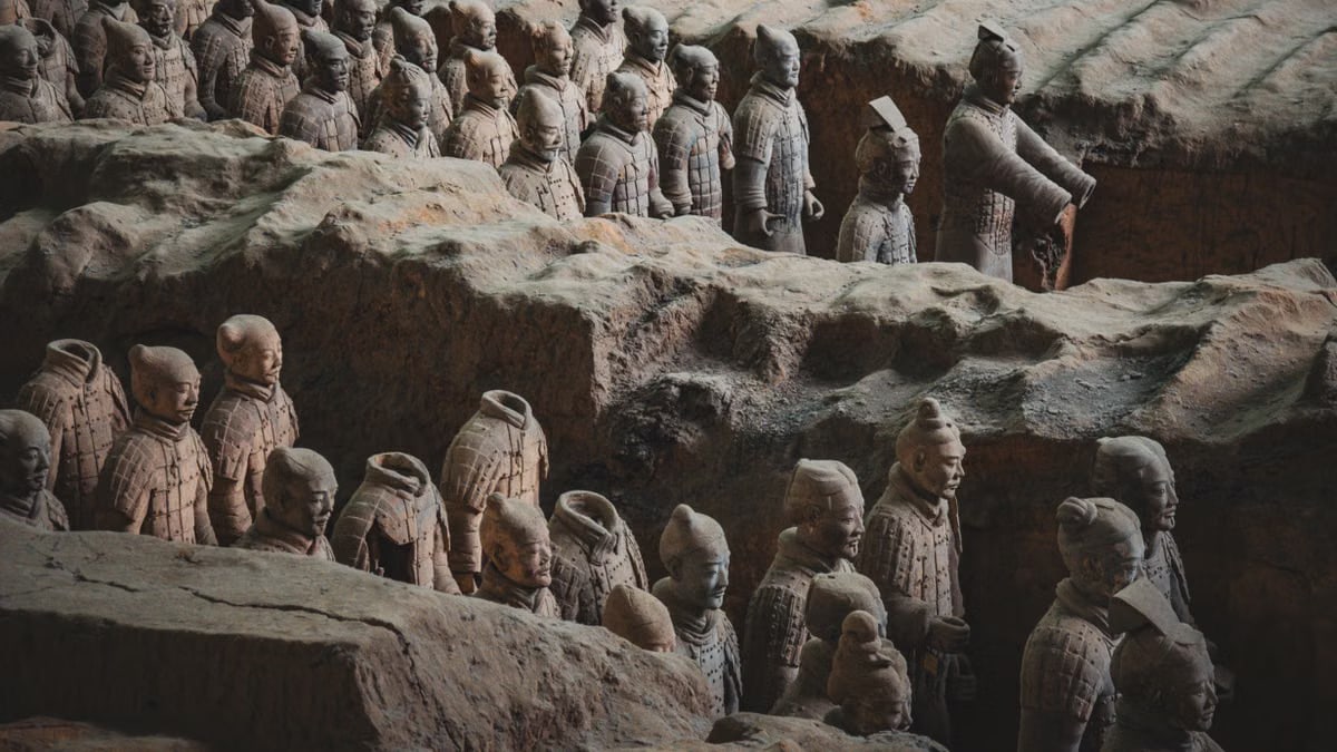 Explore the iconic Terracotta Army in Xi'an, showcasing ancient Chinese sculptures of warriors and horses. Captured in detail.